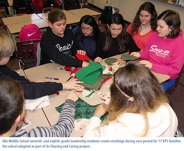 Photo: Alki Middle School seventh- and eighth-grade leadership students create stockings during zero period for 17 VPS families  the school adopted as part of its Sharing and Caring project. 