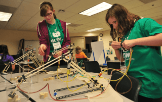 Photo: Students operating robots they built