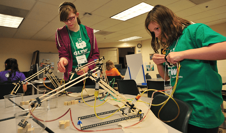 Photo: Students operating robots they built