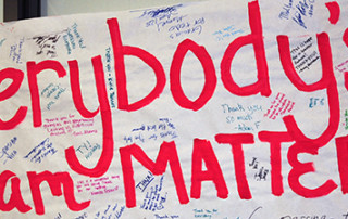 Photo of banner that says, "Everybody's dream matters."