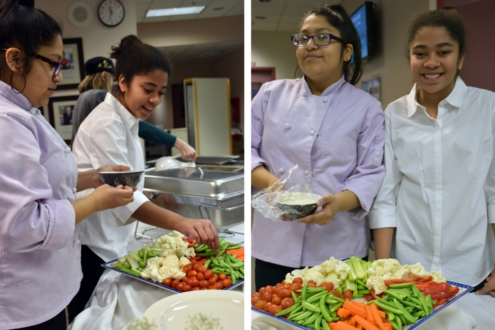 Culinary Arts students set up food for the patron tour lunch