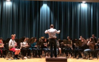 Honor band students rehearsing for their annual concert