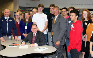Photo: State Superintendent Reykdal signs new educational technology standards