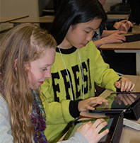 The weLearn 1:1 rollout begins at Alki Middle School, where sixth-graders receive iPads to use at school and home.