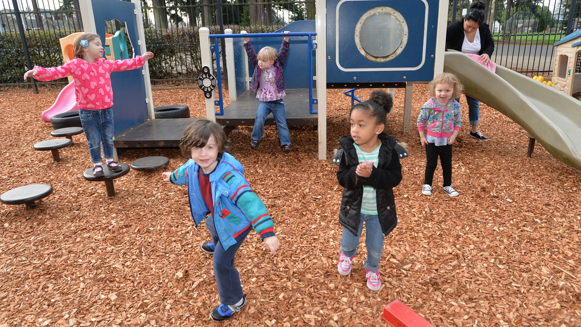 Children at childcare playing on playground