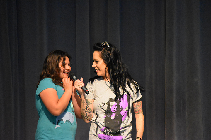 Student at an assembly with singer Kat Perkins