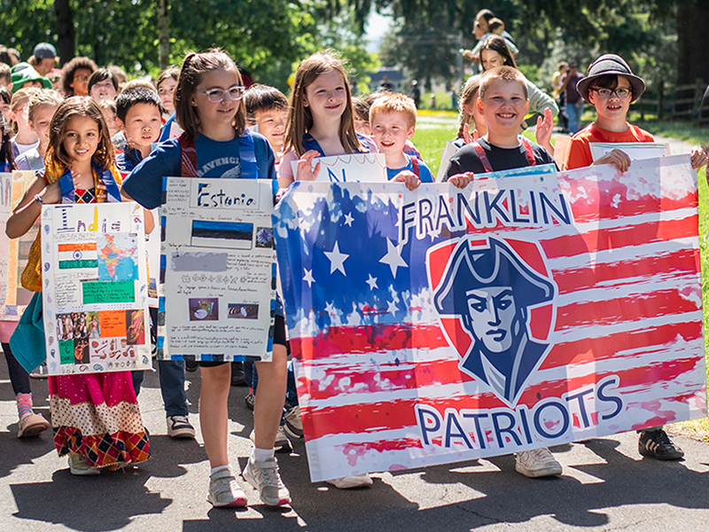 Cultural Parade 2024. Franklin Elementary students marching.