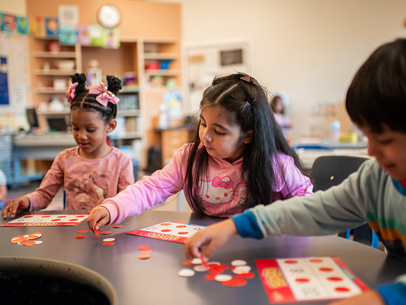 Transition to Kindergarten classroom at Washington Elementary. Students playing bingo.